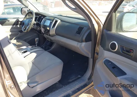 2015 Toyota Tacoma Base V6 z USA, uszkodzony, nr VIN 3TMLU4EN2FM192007